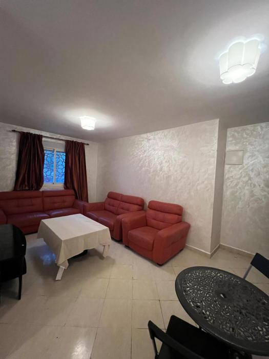 2 Bedrooms 3 beds and a living room in Dar Bouazza