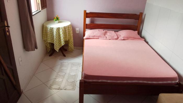 Casa Rosa da Ilha - Suíte Confortável com Ventilador e Jardim