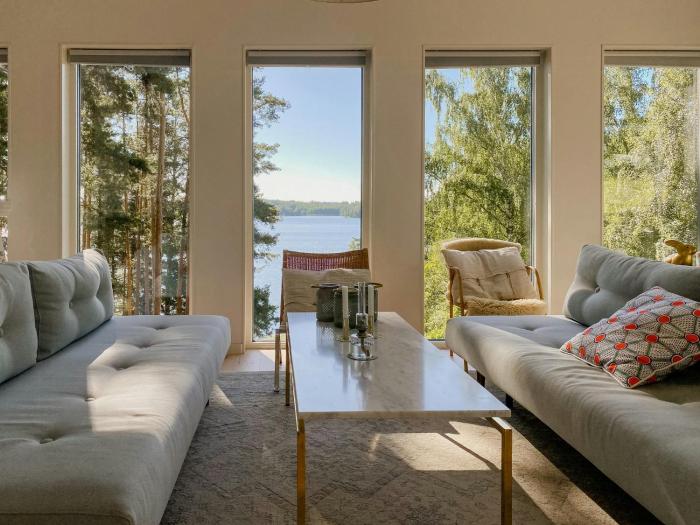 Modern Glass House With A View Over Lake Lejondal