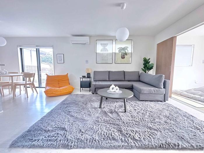 Near Airport and Aso Volcano Modern 4BR Residence by Restavio