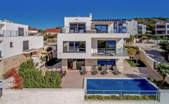 Villa TATJANA SOL with a pool, hot tub, gym
