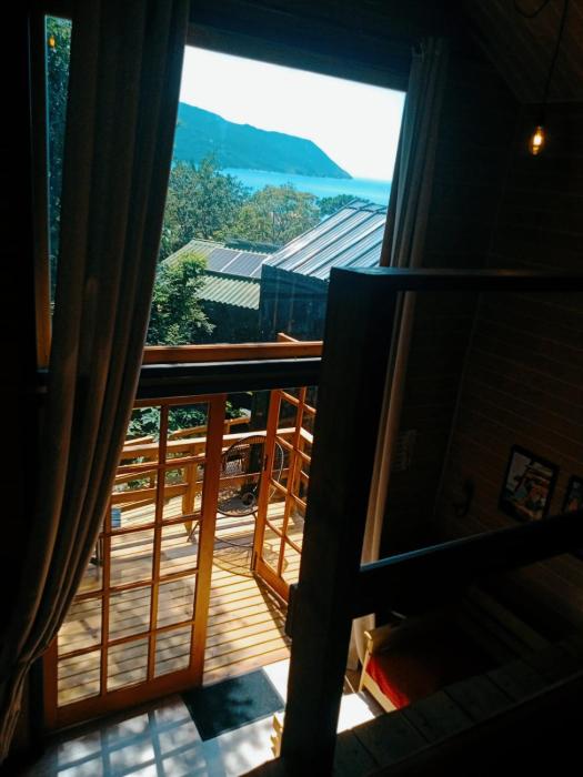 Chalé Lagarto com vista Praia da Solidão em meio a natureza, Florianópolis