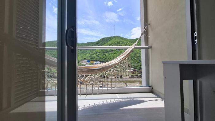 Loft tranquilo con balcón y hamaca WiFi Cerca a la playa