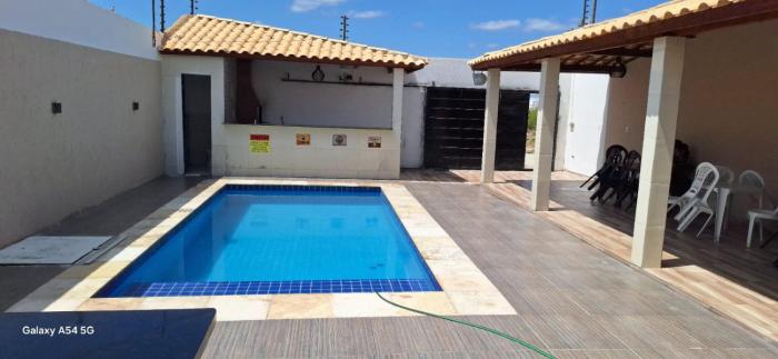 casa com piscina Espaço para laser
