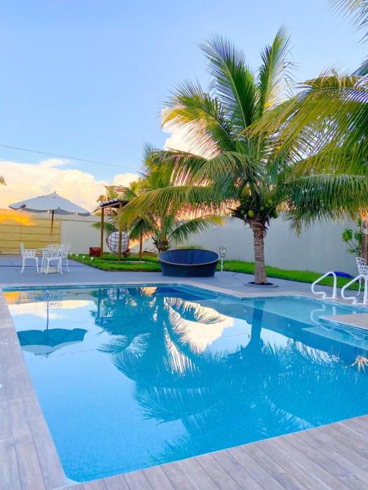 A casa Paradisiaca l Piscina Aquecimento Elétrico Ambientes Climatizados, Piscina com Led Noturno e Hidro com Cascata com Ofurô super Quente