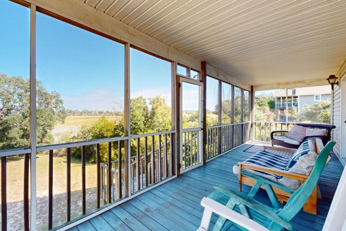 Walk to Beach | Marsh-View Escape with Screened Porch & Outdoor Shower