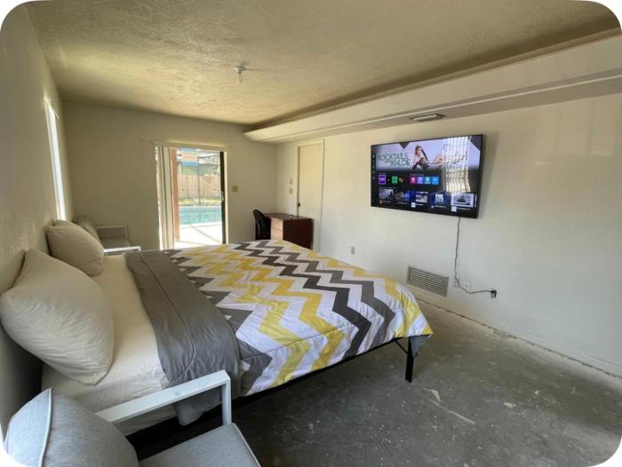 Master Bedroom With Private Bathroom And Private Entrance