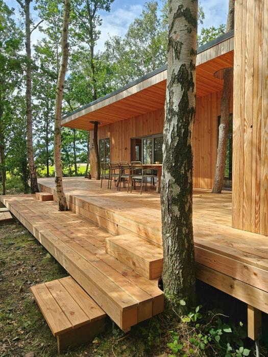 Handbuilt Cottage In Untouched Forest By Langø