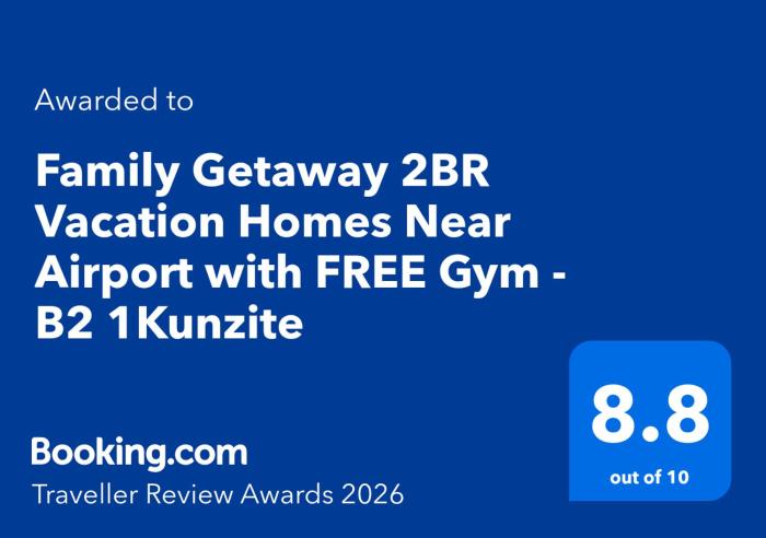 Family Getaway 2BR Staycation Airport with FREE Gym, FREE Pool, FREE Parking - B2 1Kunzite