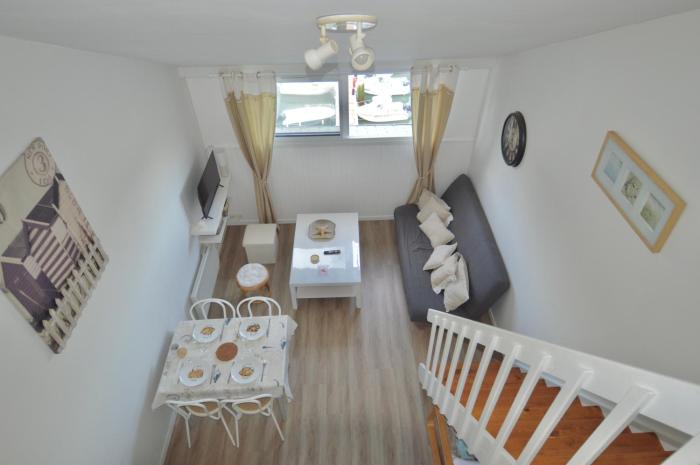 Aux beaux coquillages, vue mer et sur le port