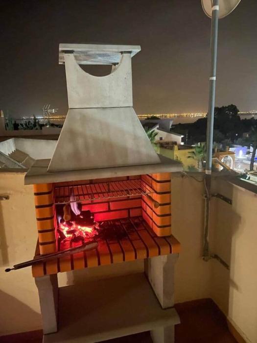 Stylish 2BR with Private Rooftop & Sunset BBQ