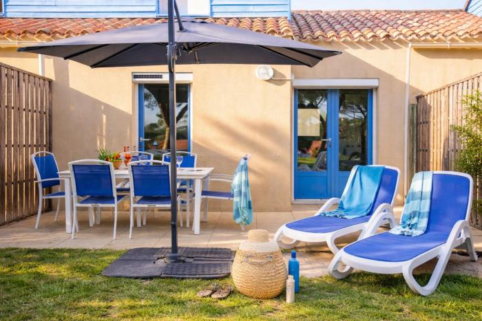 Maison mitoyenne de vacances - piscine commune et espaces verts - 4 personnes