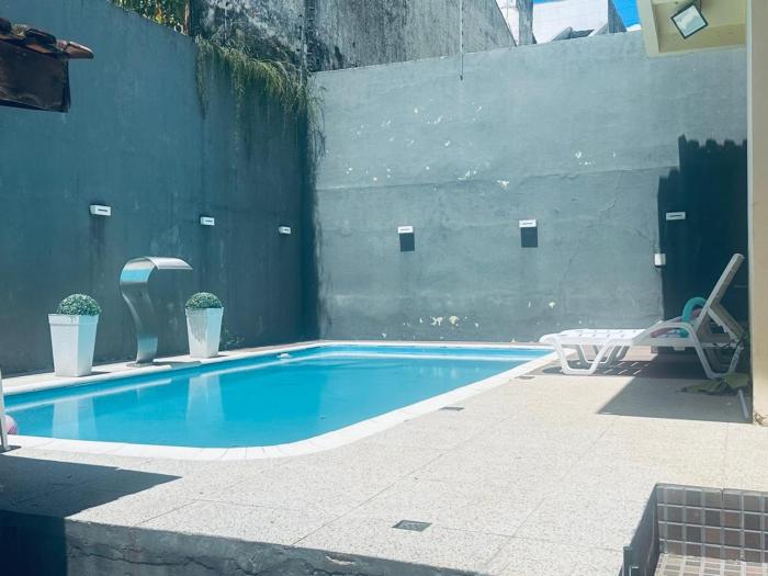 Casa Completa com Piscina e Conforto no Centro