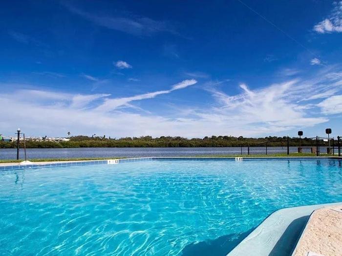 Beautiful Waterfront Condo short walk to the beach your search ends here