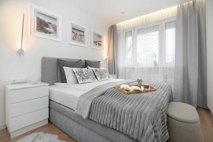 Toruń Cozy Apartment with Balcony by Noclegi Renters