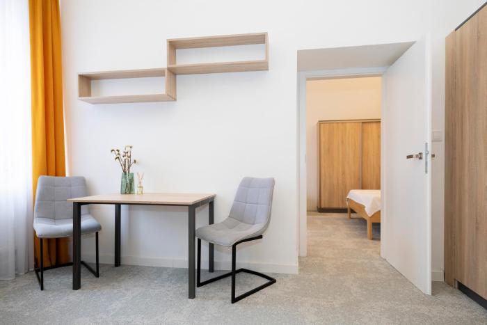 ALURE RESIDENCES 2 - 24h self check-in & private parking next to the apartment building included, CITY CENTER right on SNP Square in a quiet passage, new building, best deal in town