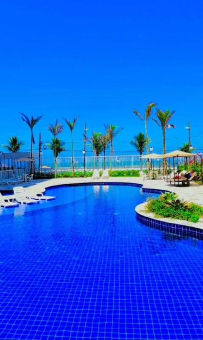 apartamento com piscina pé na areia