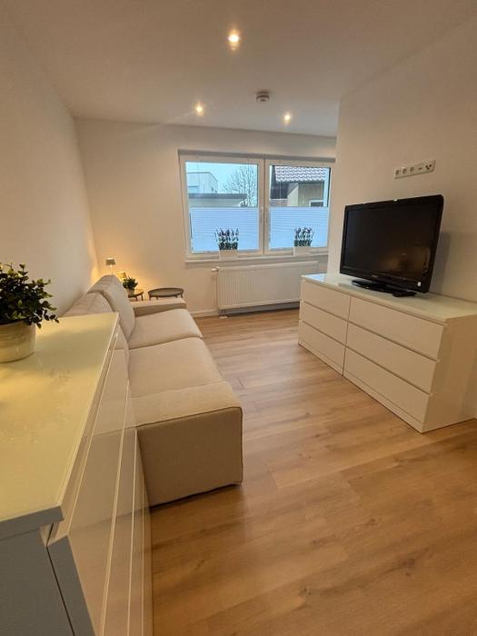 Zentrale Wohnung mit eigenem Eingang und Stellplatz