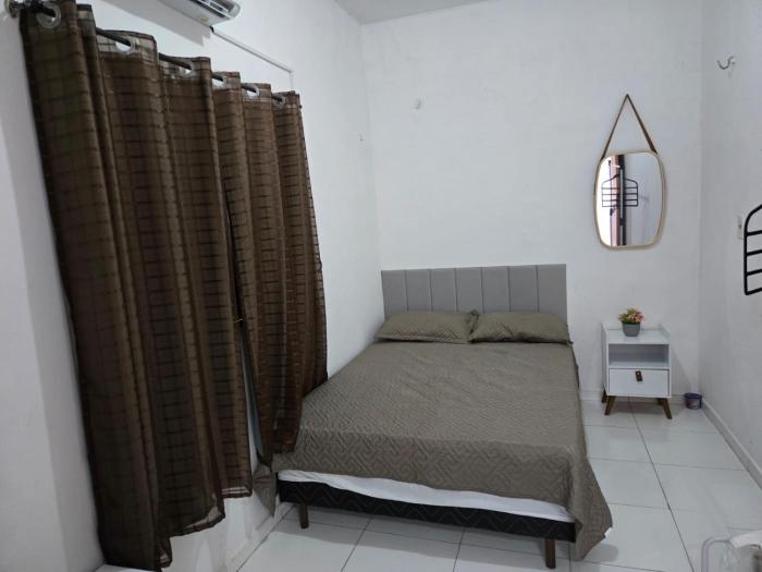 Quarto casal com ar condicionado