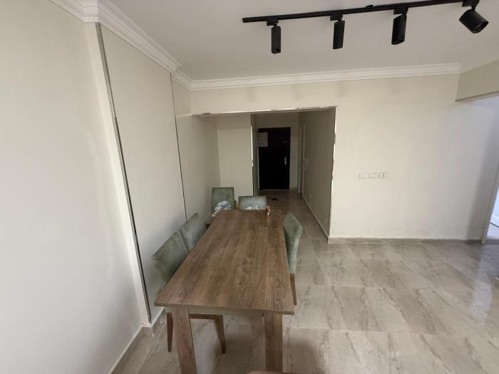 شقة مريحة بالتجمع على بعد دقائق من Auc