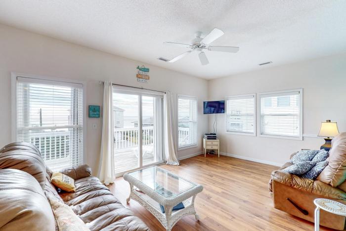 Second-row beach home with ocean views & outdoor shower - dog-friendly