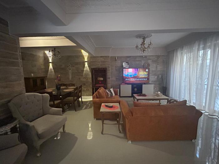 Elegant Furnished Apartment with Private Garden South Academy