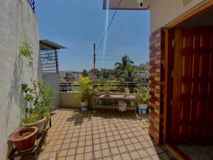 Mindful Rooftop Yoga Stay in Gokulam Bright, Airy Private Family Terrace Apartment