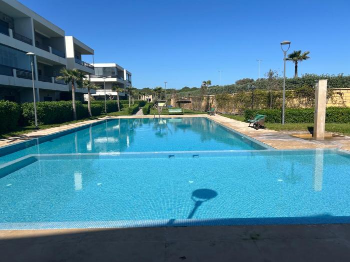 Beach-front paradise with parking and pool