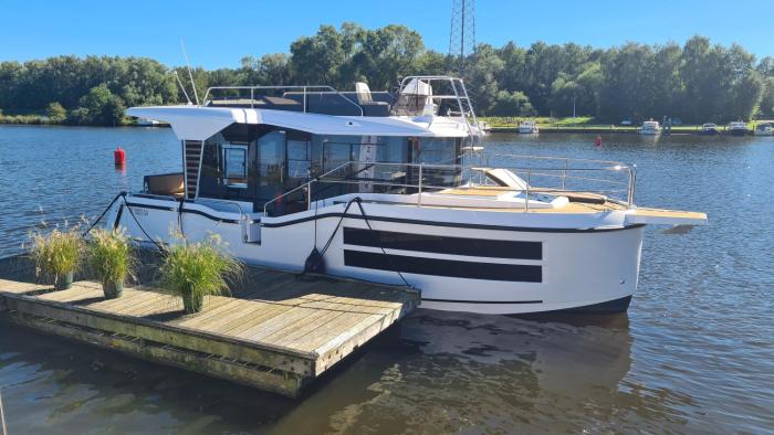 Luxury motor yacht with harbour view