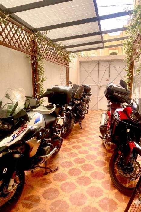 Spacious Apartment with Motorcycle Garage, Free Parking, and Air Conditioning