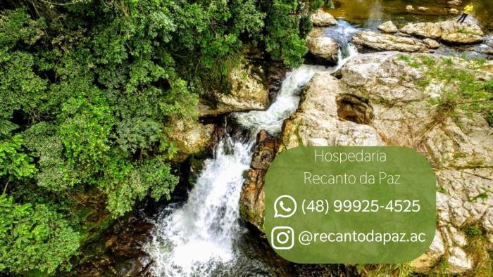 Suíte com Vista para o Rio e Cachoeira no Quintal
