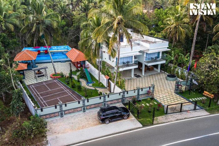 StayVista at Lagoons Kuruva with Shared Pool, Lawn
