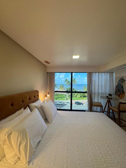 Pé na areia, vista panorâmica romântico Cabo Branco