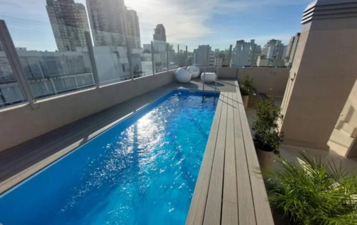 Con cochera y pileta cerca del shopping abasto