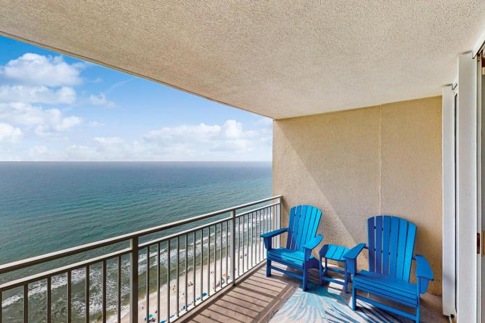 Roomy retreat on the water with private balcony shared pool & beach access