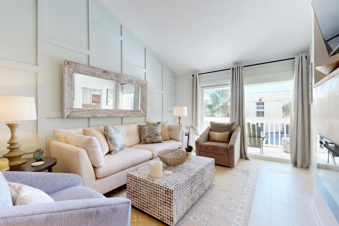 Courtyard view condo with private beach access private balcony & free WiFi