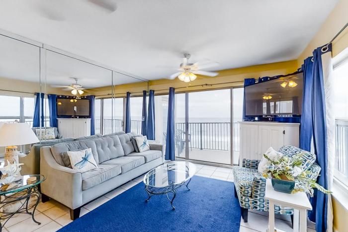 Wonderful Gulf-front condo with pool corner balcony central AC & beach access