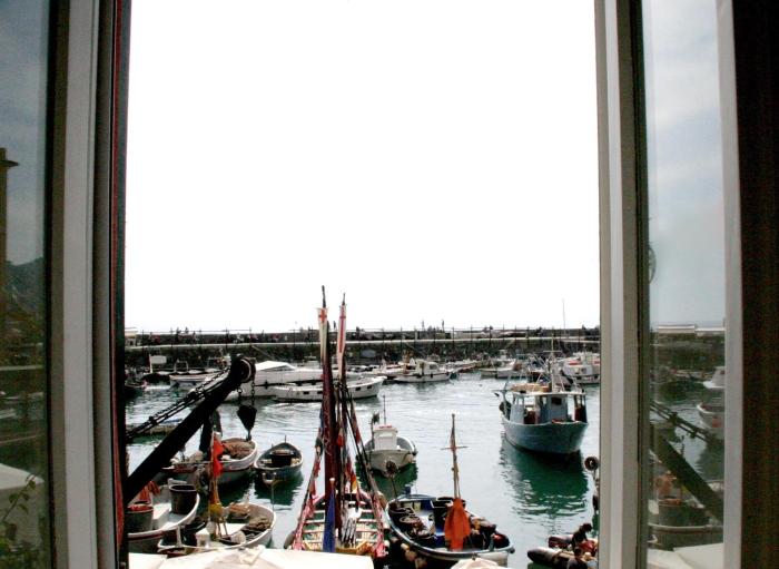 Casa sul porticciolo - Mancina