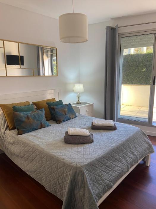 Apartment by the sea & town