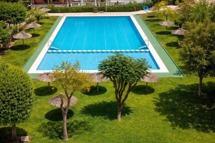 4BR Apt 10 min Walk to San Juan Beach - Pool & Terrace