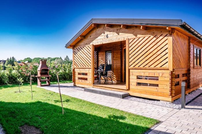 Holiday homes with terraces, sauna whirlpool