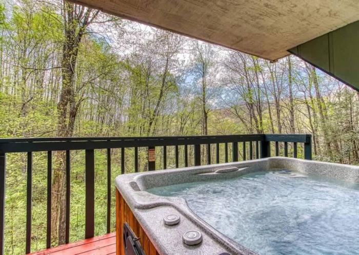 Woods Child Cabin by Beyond Expectation w Hot Tub