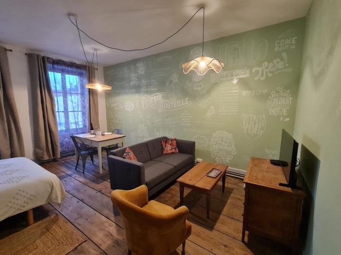 Le Nid du Facteur appartement avec clim, wifi et jardin