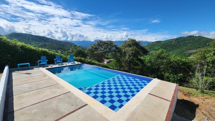 Hermosa casa privada con piscina infinita y WiFI