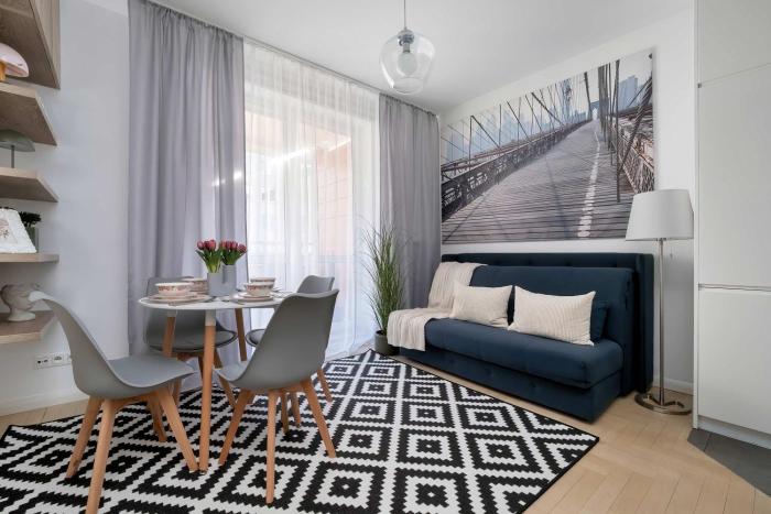 Cozy Apartment with Balcony & Parking by Noclegi Renters
