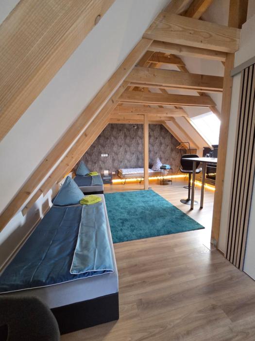 Moderne Dachgeschosswohnung am Wald