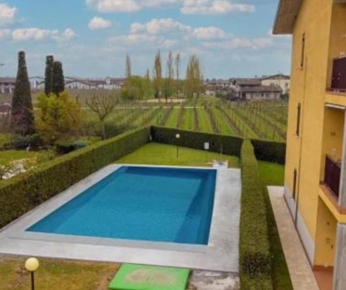 Residenza Adore with pool, parking, and Wi-Fi