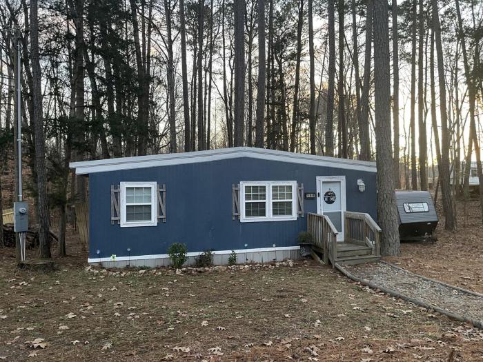 Charming Lakefront Tiny Home with Fire Pit, Grill, and Bocce Ball Near Littleton, North Carolina