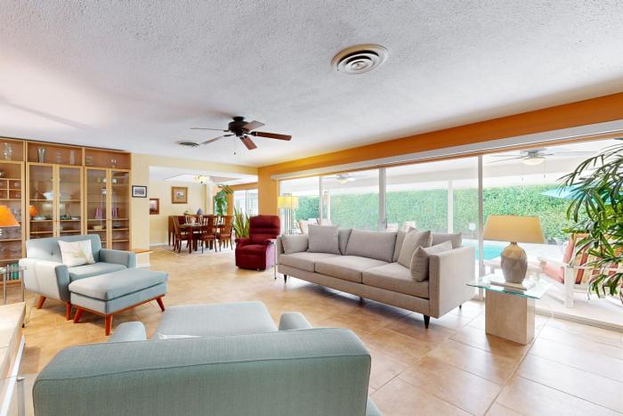 Eclectic midcentury dogfriendly home with private pool yard gas grill