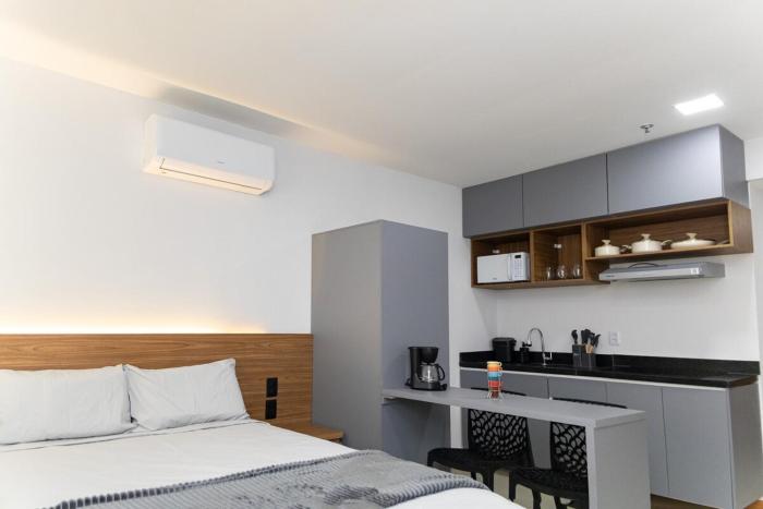 Flat com cozinha e garagem